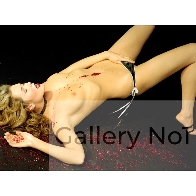 Find a semi naked photograph of Nicola McClean for sale