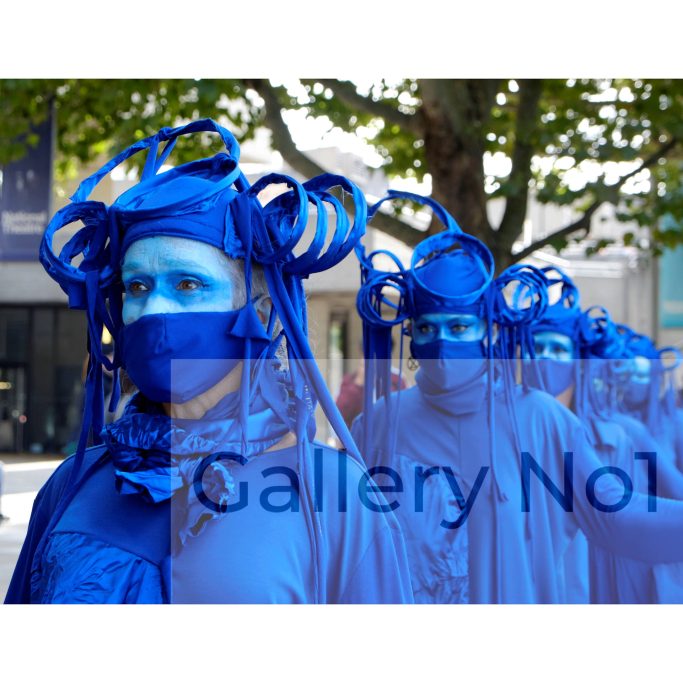 Find photograph of Blue rebel brigade
(Ocean Rebellion protest march, London)