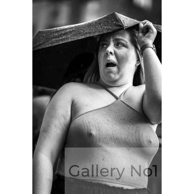 Look for street photography of young girl in the rain for sale
