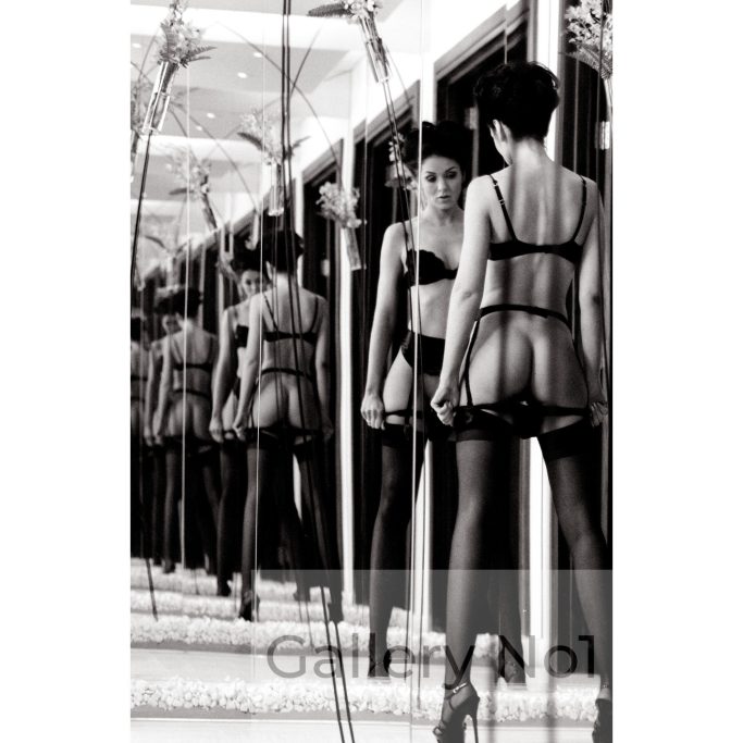 Look for a photograph of woman in underwear multiple reflections