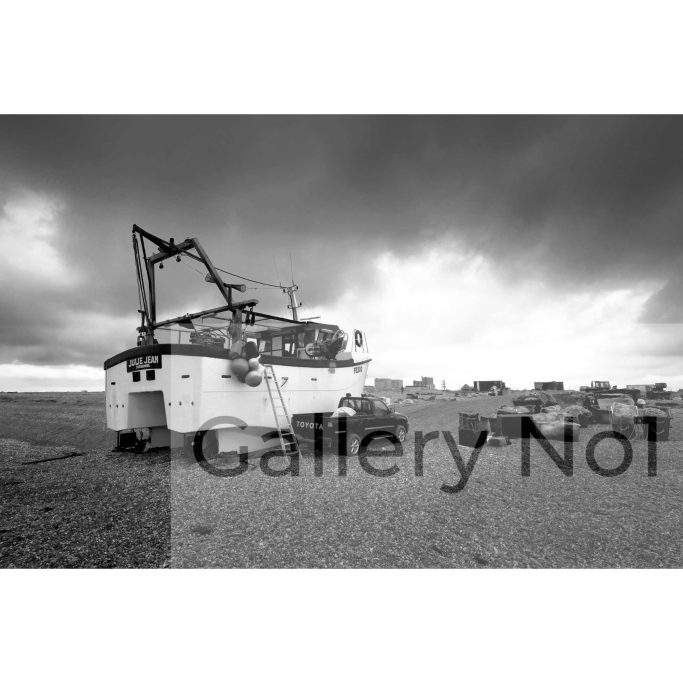 Look for photograph of fishing boat getting ready to leave Dungeness Beach
