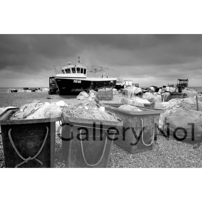 Find photographs of fishing boats and crates on Dungeness beach