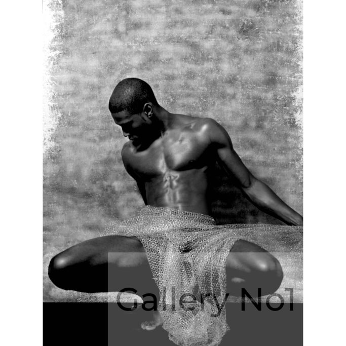 Find a photograph of naked man covered in bubble wrap