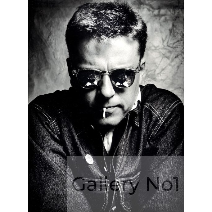 Find a portrait photograph of Suggs from Madness by Stephen Perry