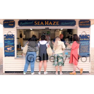 Find photograph of people queueing at fish stall in Brighton for sale