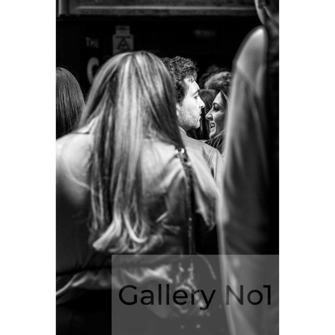 Look for street photography of girl in a crowd by Matthew Wardell